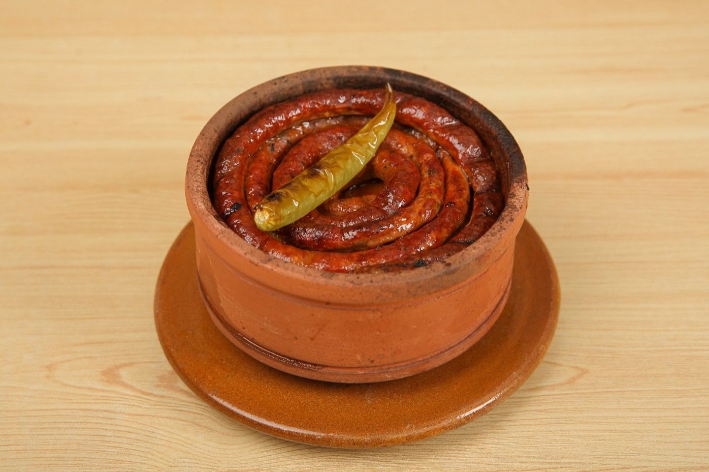 طاجن بطاطس سجق