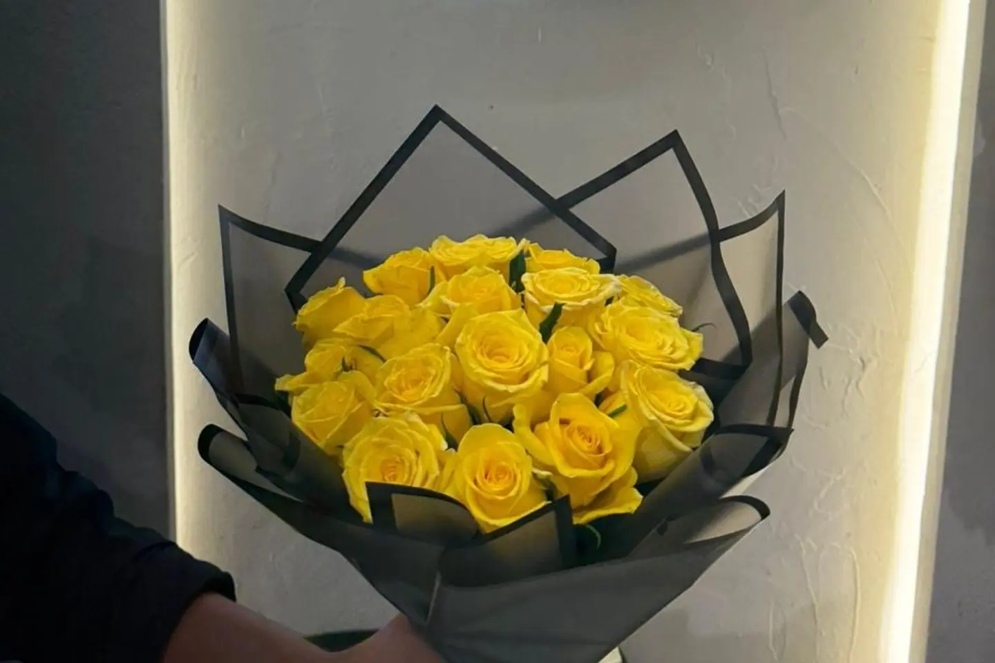 Bouquet With Black Wrapping And Yellow Roses