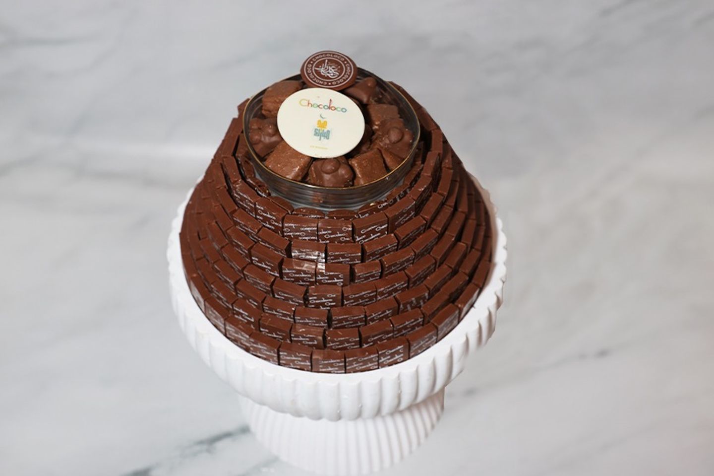 A Tray With A Base Large Size Containing Pyramid Shaped Chocolates