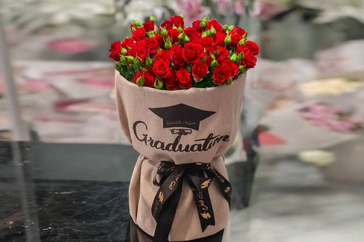 باقة تخرج - وردة صغيرة حمراء