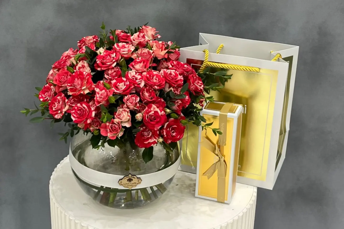 A Vase Of Roses With Garden Chocolates 551