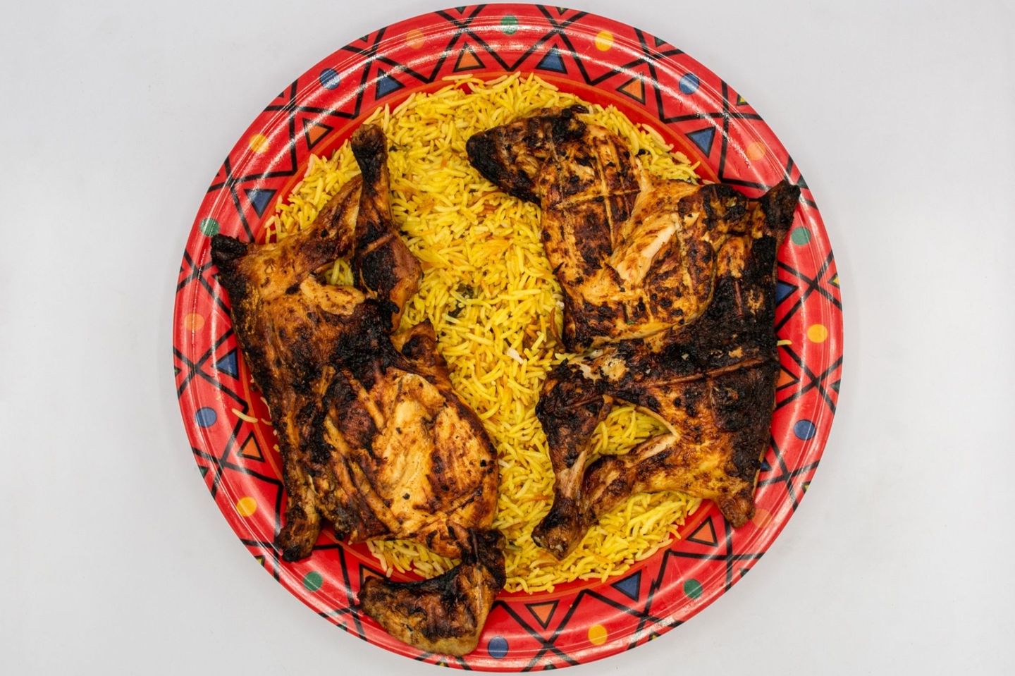 دجاج على الفحم مع ارز بخاري