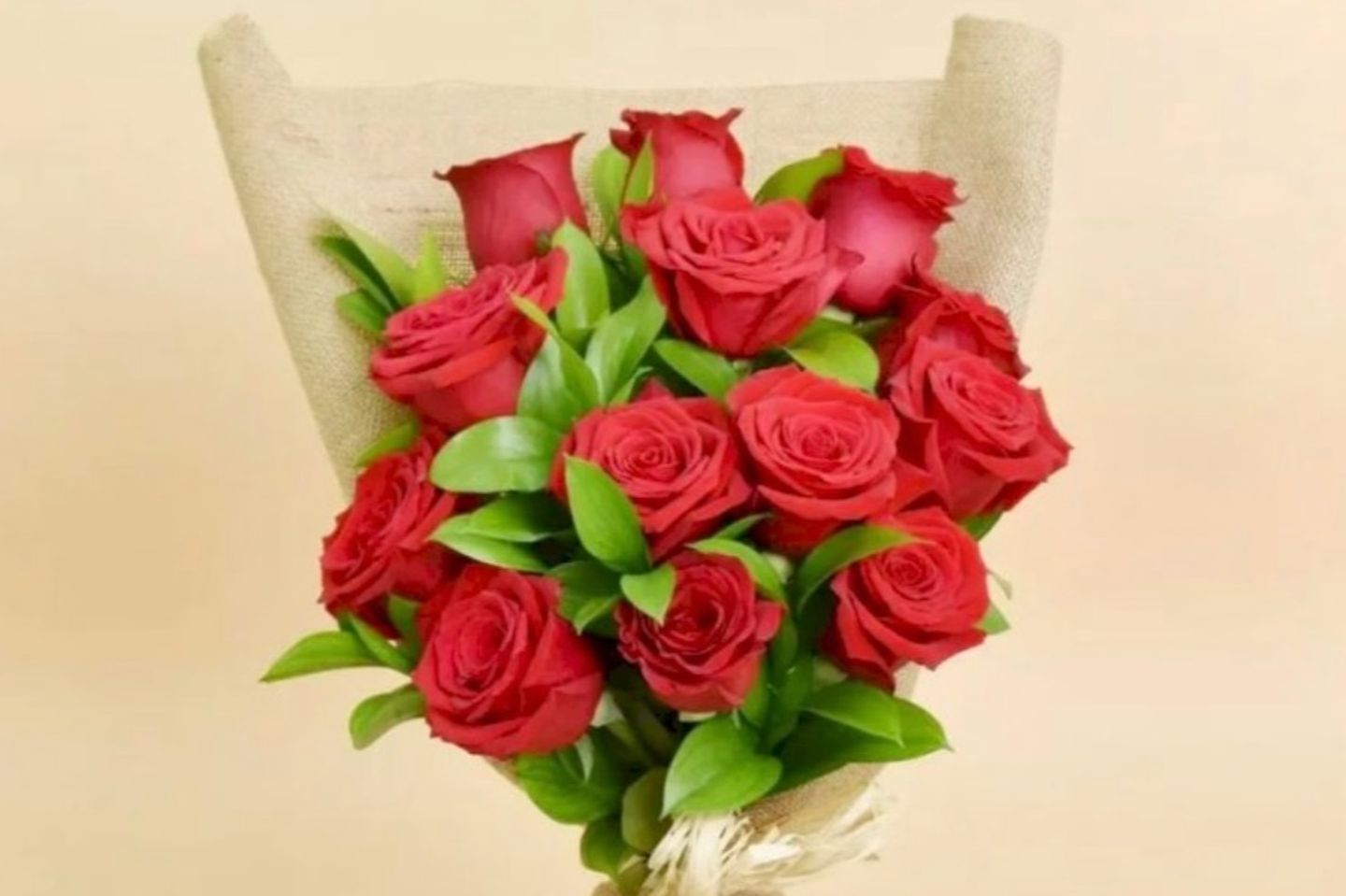 Hand Bouquet Red Roses With Green Leaf