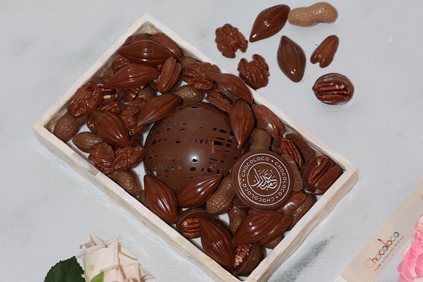 Small Wooden Tray Containing Nut Shaped Chocolates