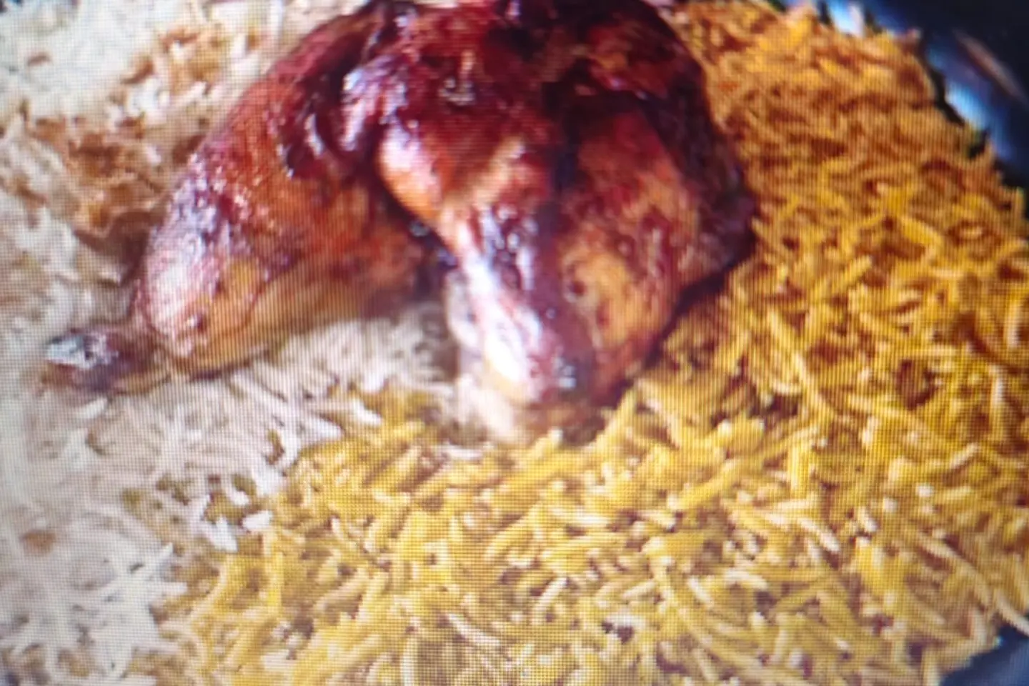 Half A Grilled Chicken With Rice