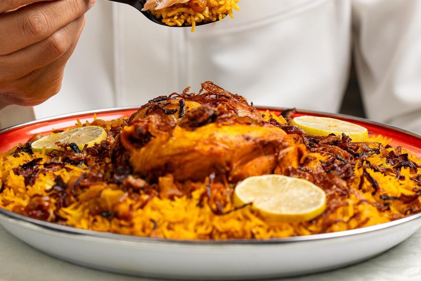 نصف دجاج كبسة حساوية