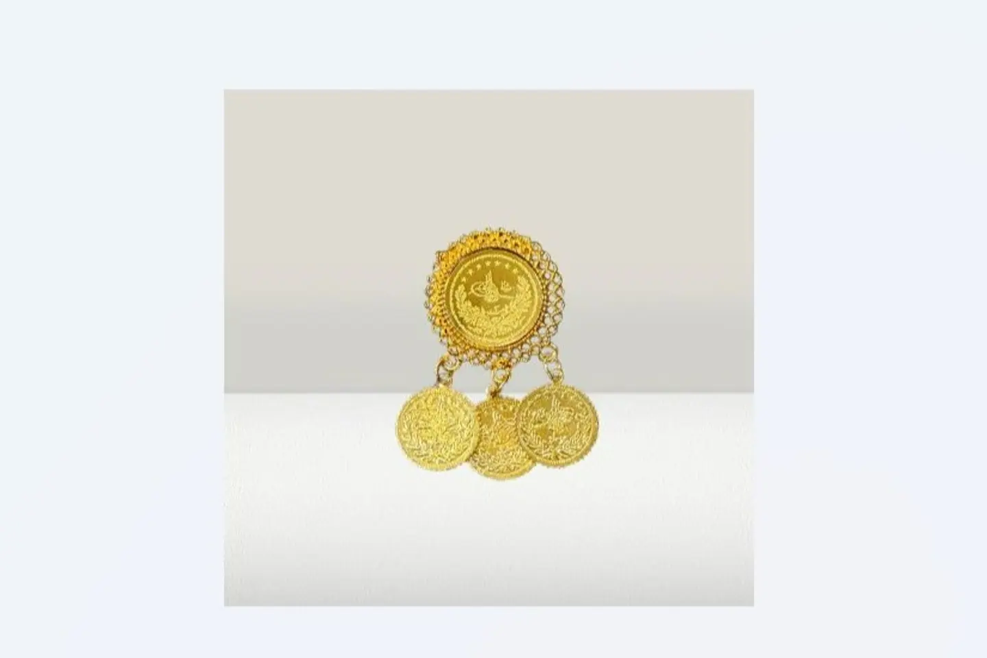 Gold Pound Brooch