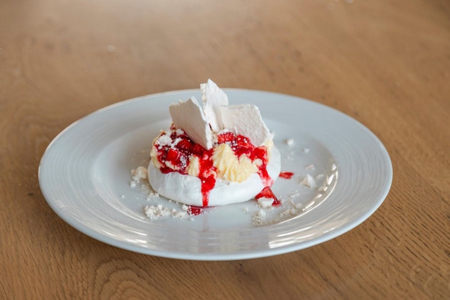 Pavlova With Berry Coulis And Mastica Cream