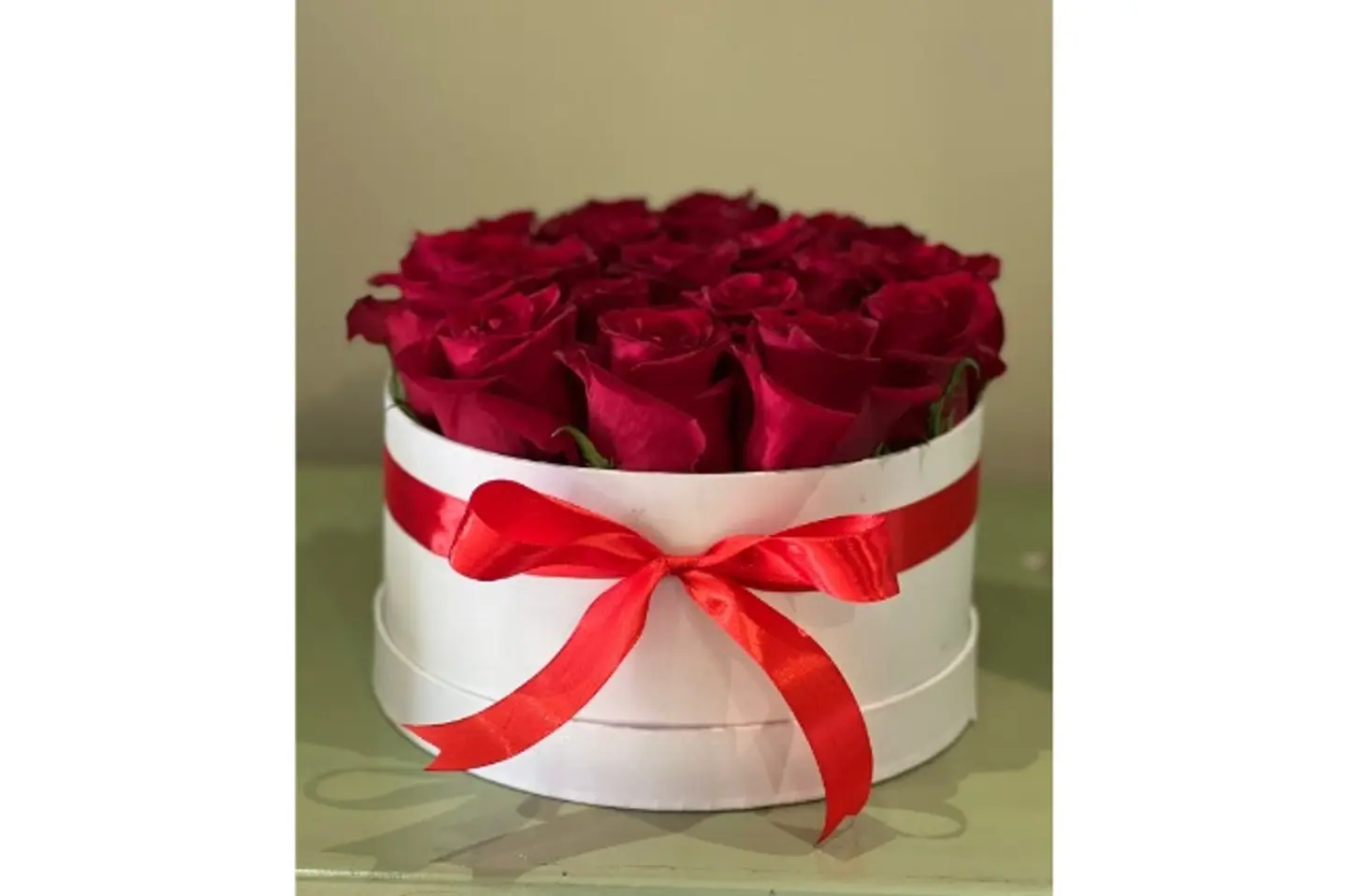 Red Flower Arrangement With White Box