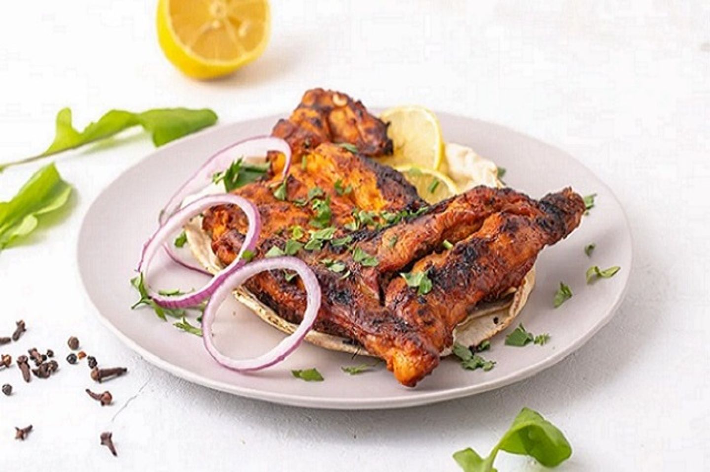 Half A Piece Of Chicken Grilled On Charcoal Without Rice