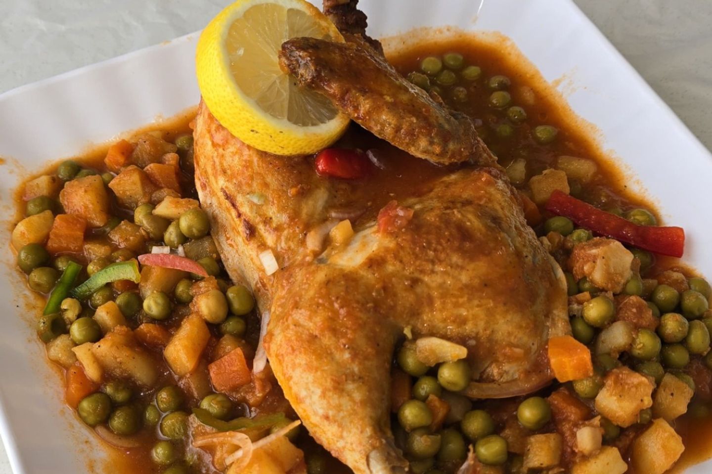نص حبة بالدجاج فرن بالخضار