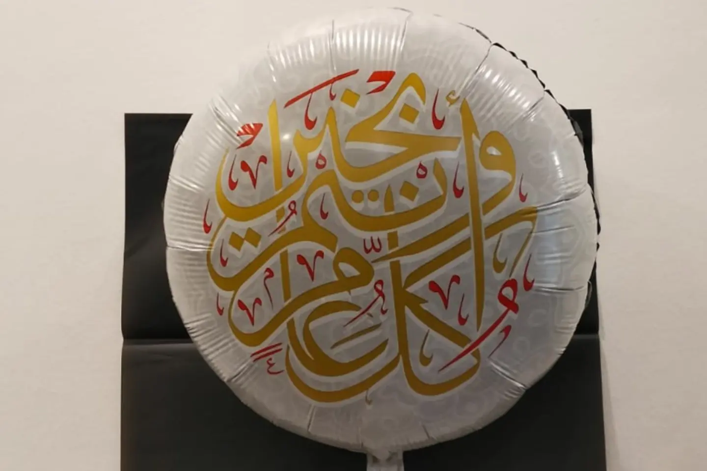 Helium Foil Balloon With Happy New Year Written On It