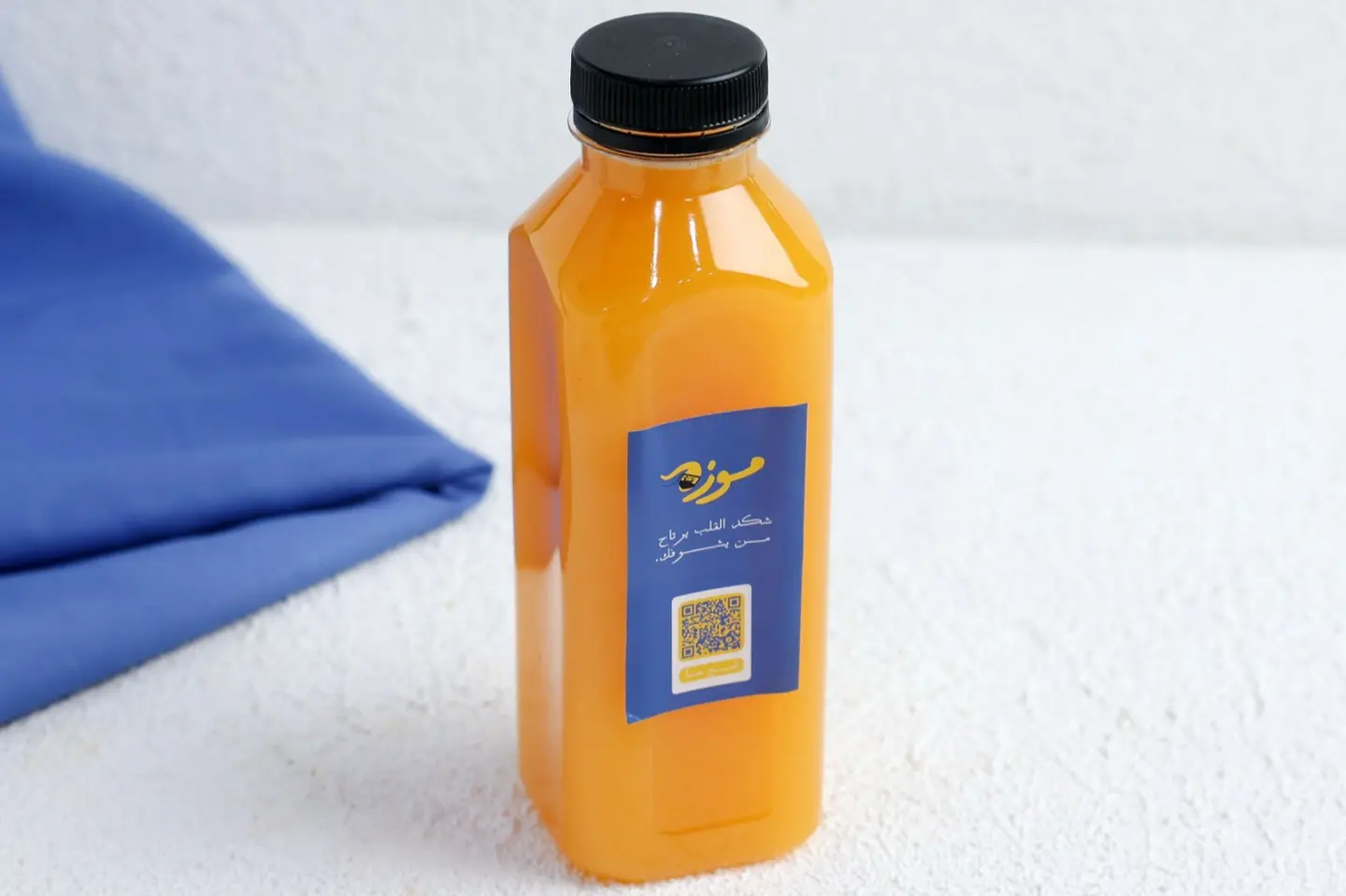 عصير برتقال طبيعي نصف لتر