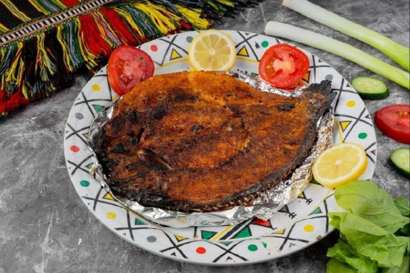 سمك حنيذ خمس وستون ريال