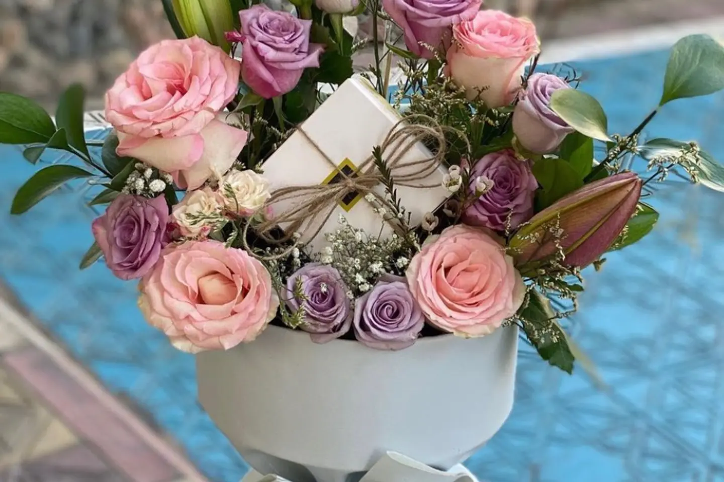 Leather Bouquet With Roses And Patchi Sweets
