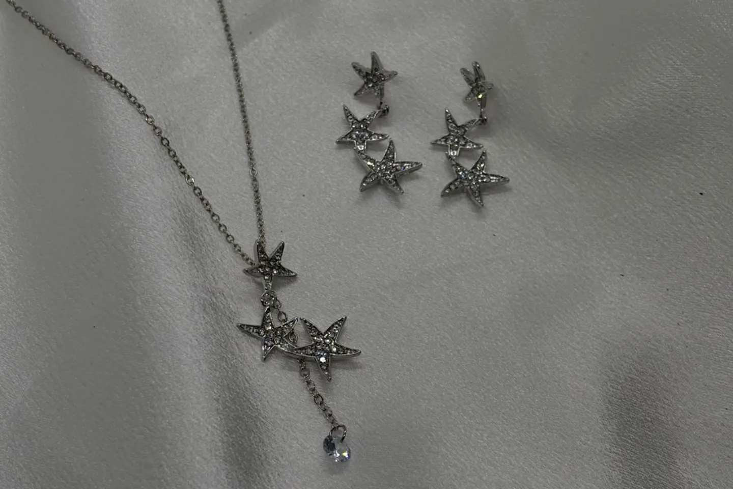 طقم نجوم فضيه