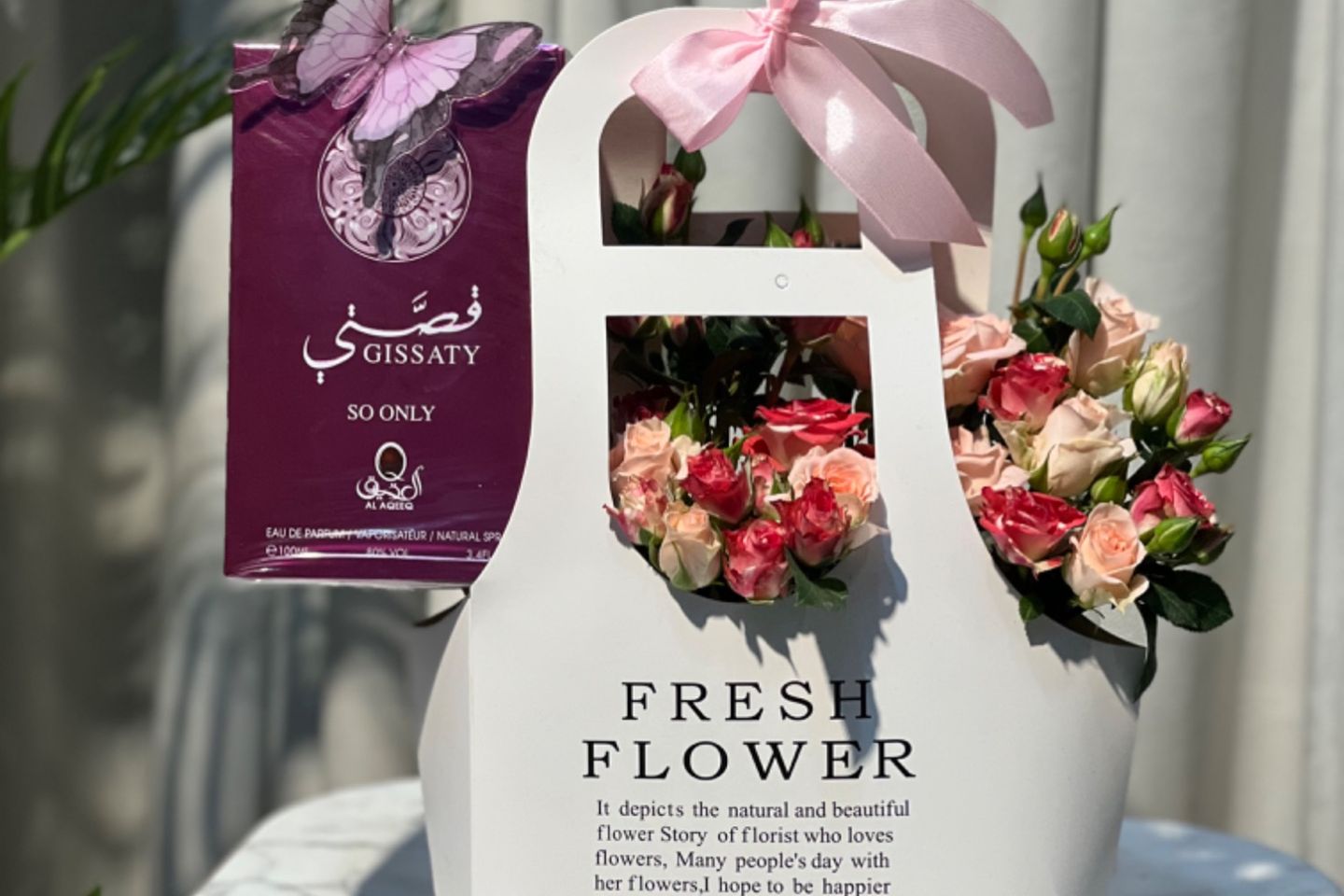 Woman's Perfume With Roses
