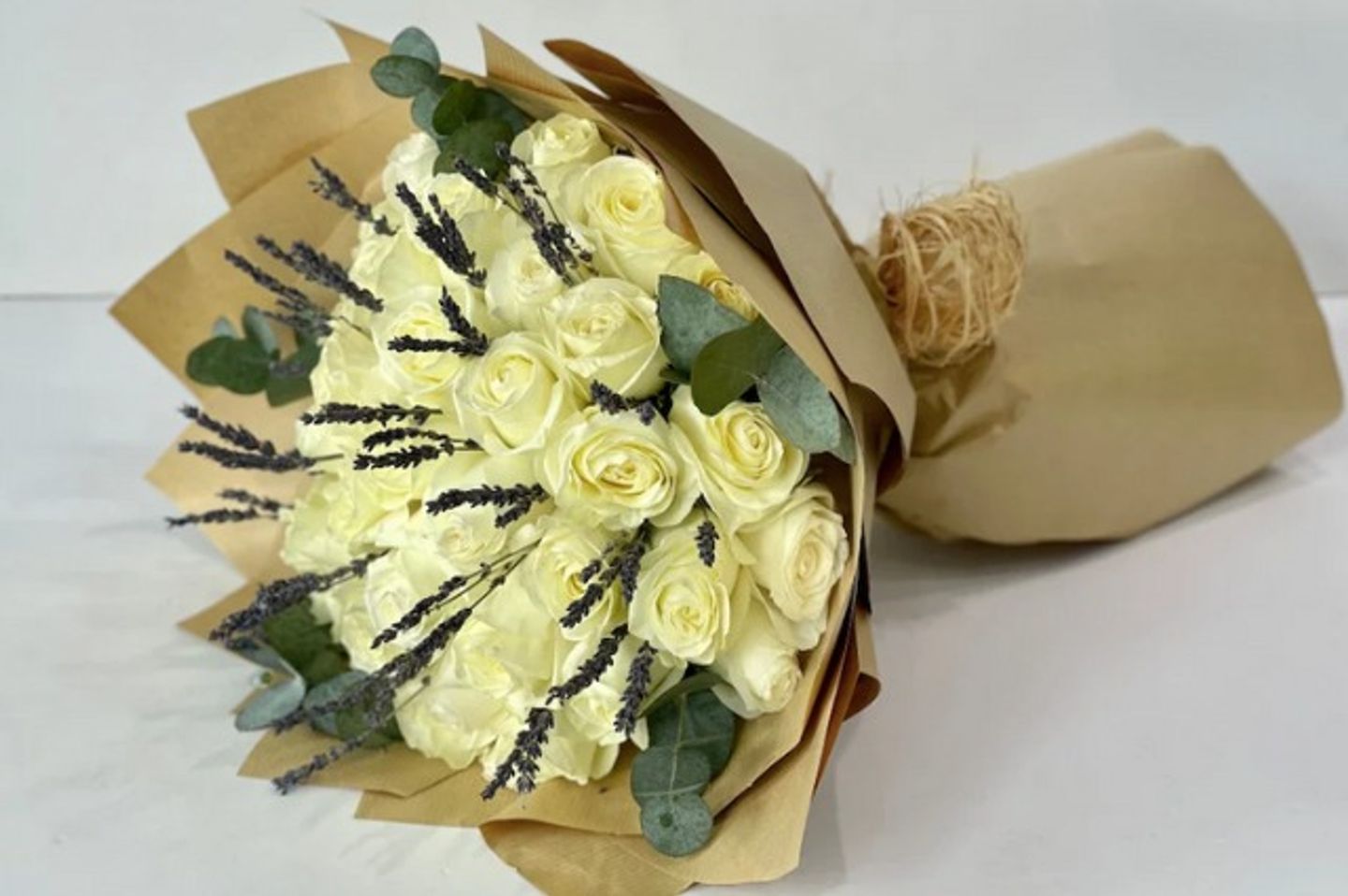 A Bouquet Of White Roses With Lavender 30