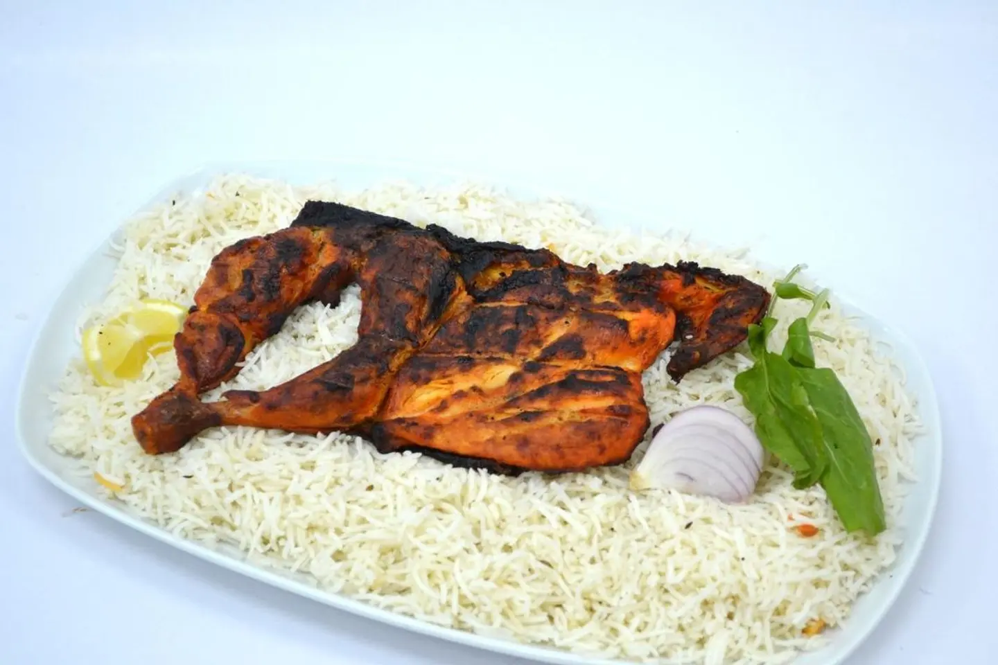 نصف دجاج عالفحم مع الارز