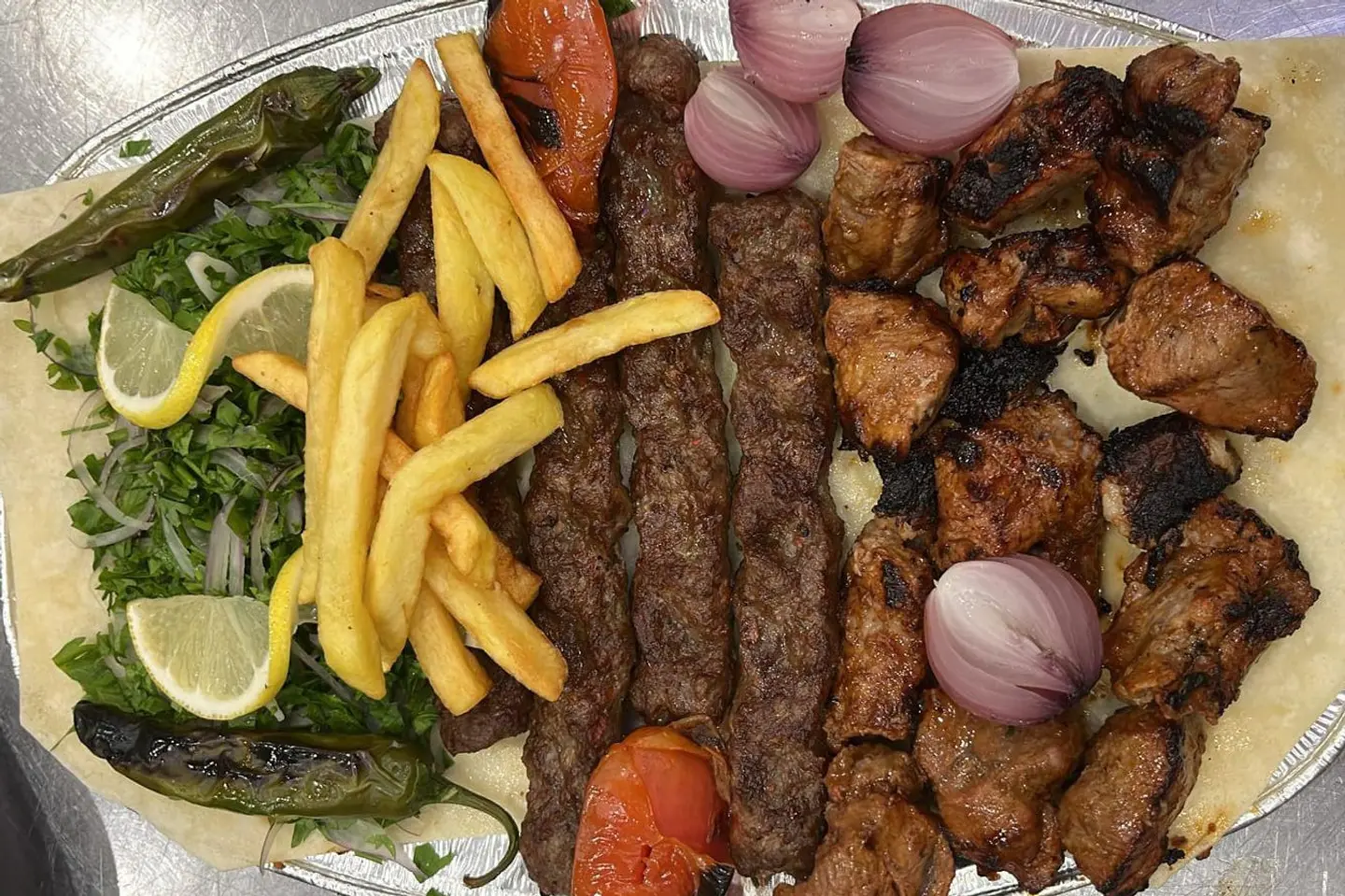 نص كيلو مشكل لحم