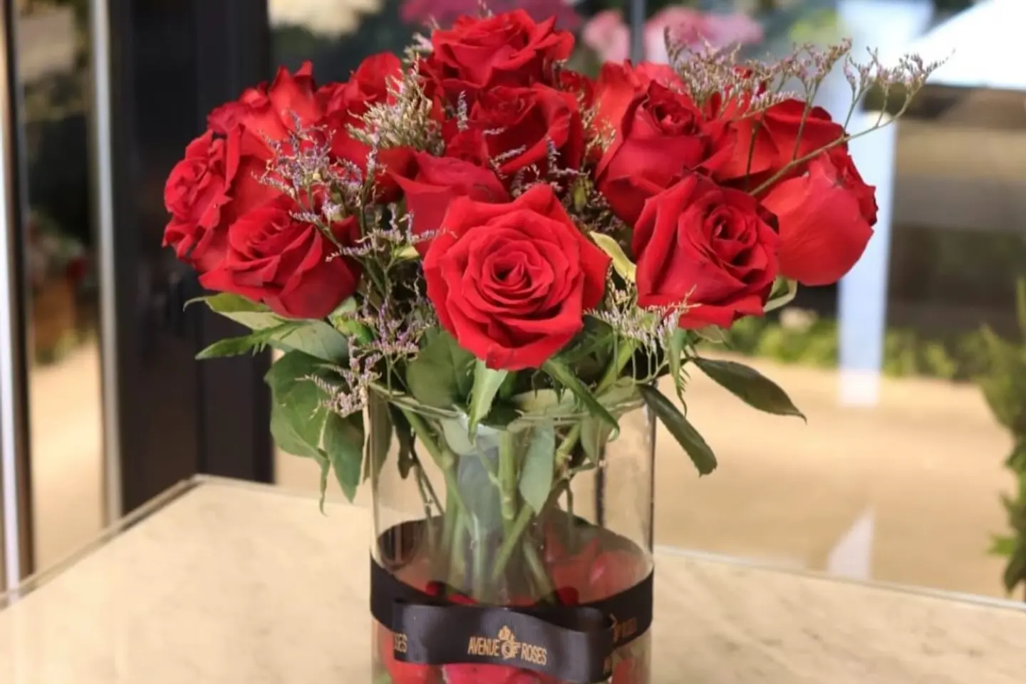 A Vase Of Red Flowers