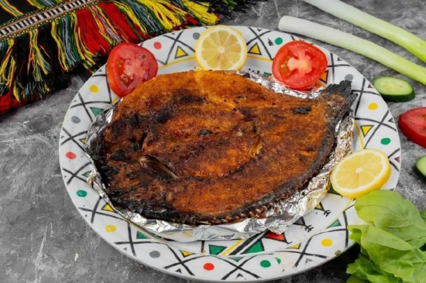 سمك حنيذ خمس وسبعون ريال