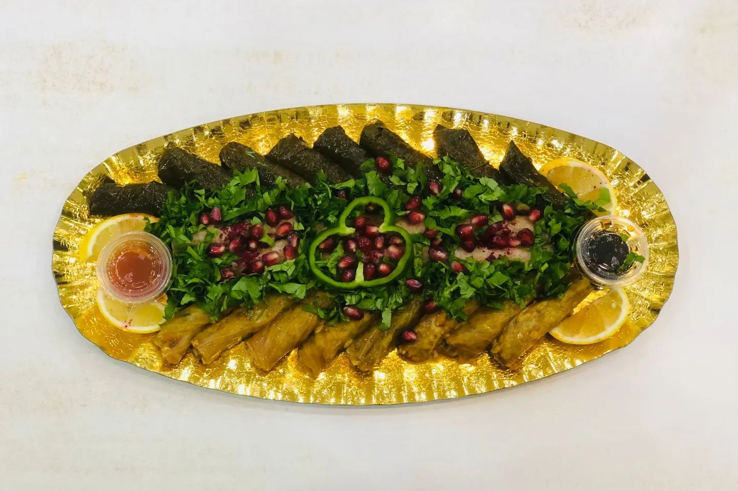 Stuffed Grape Leaves And Cabbage With Musakhan