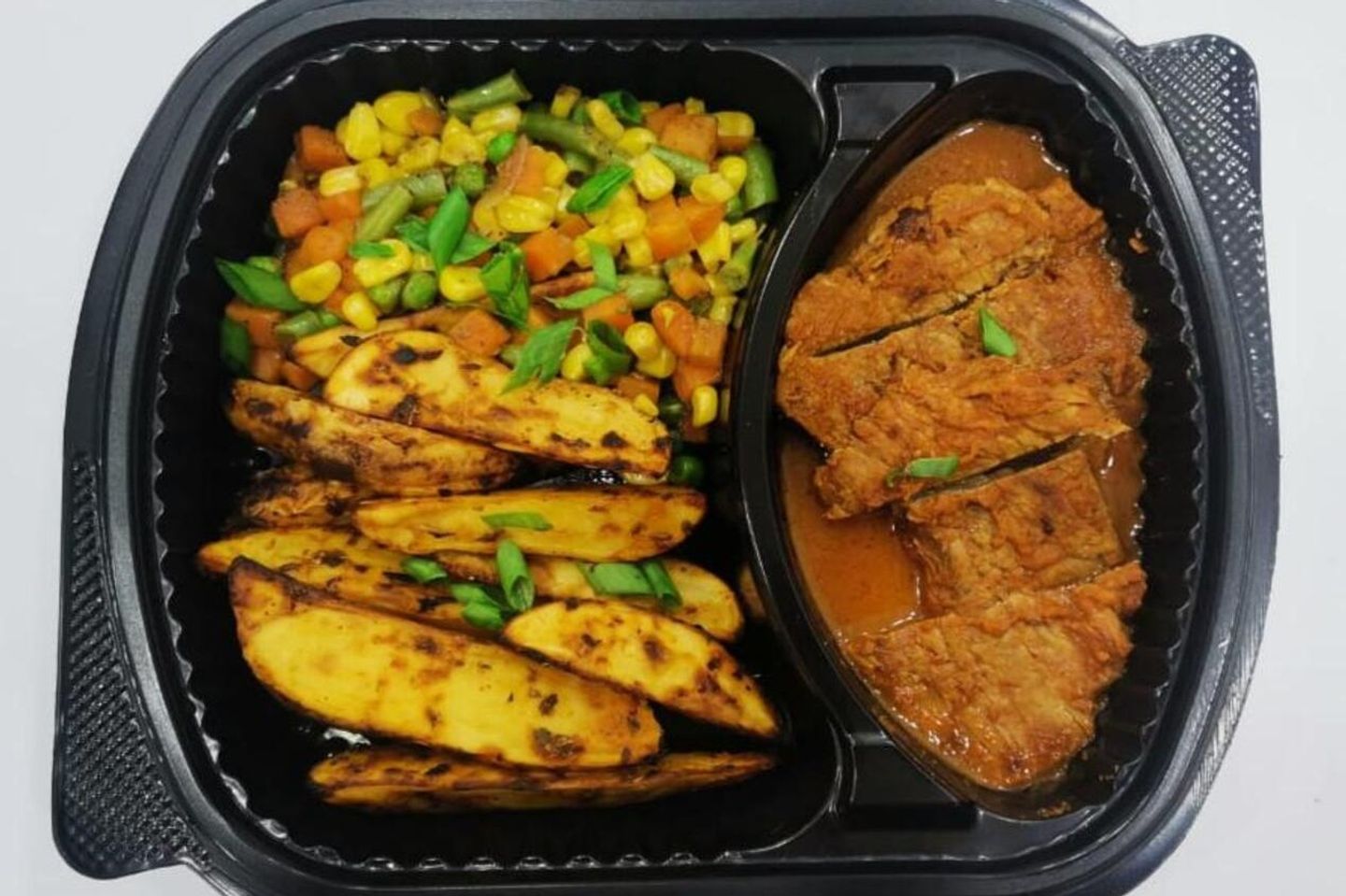 Steak Meal With Grilled Potatoes And Mixed Vegetables