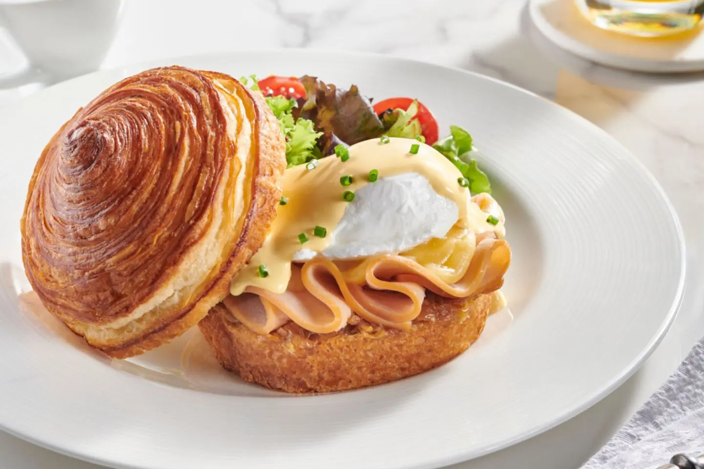 Smoked Turkey Benedict On Croissant Bun