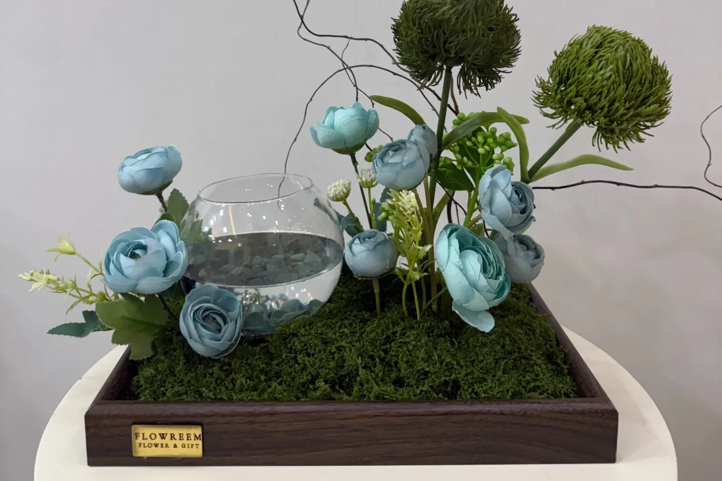 A Fish On A Wooden Base Decorated With Elegant Flowers