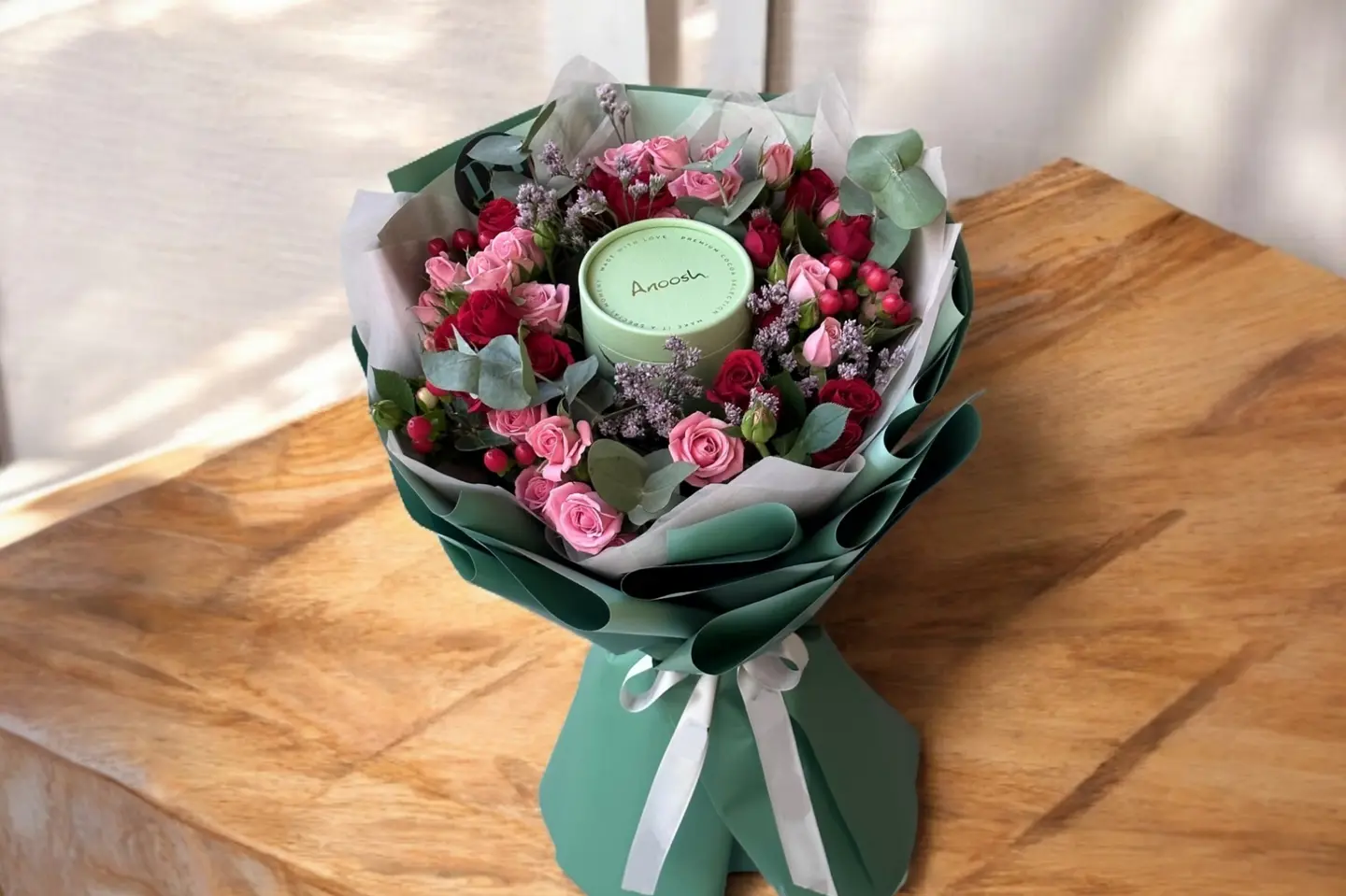 A Bouquet Of Roses With Chocolates