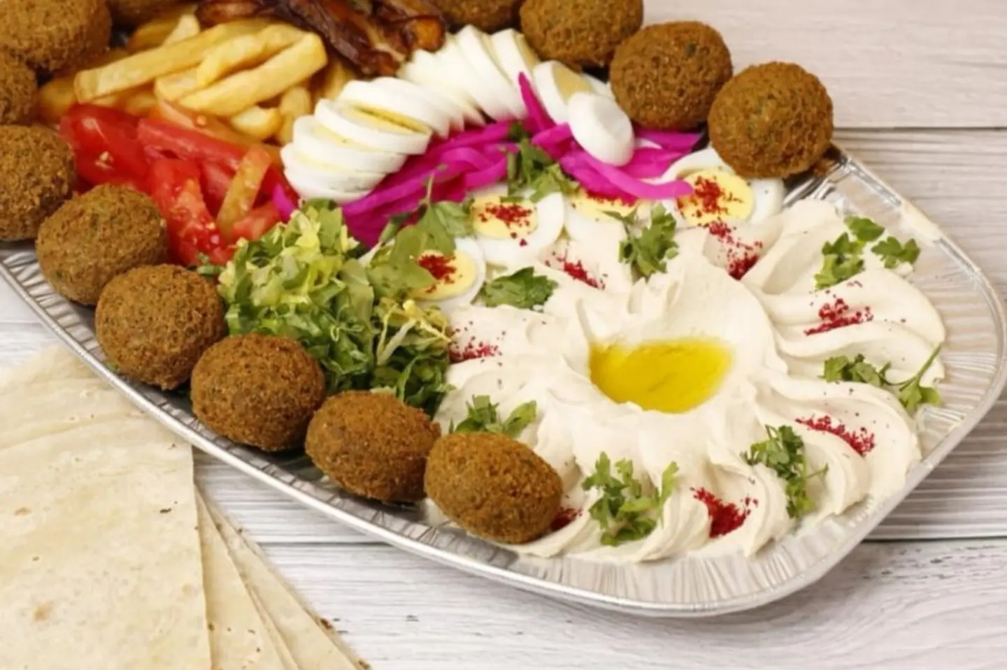 Large Family Mixed Platter/Hummus + Falafel + Fries + Eggplant + Pickles + Salad + Boiled Egg