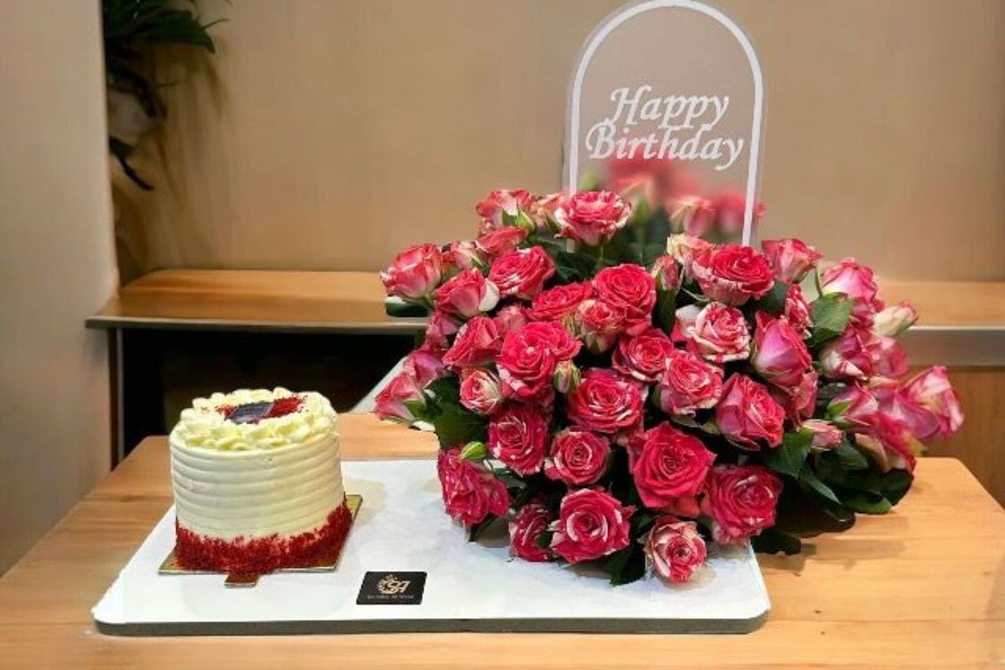 Cake With Double Color Baby Roses And A Birthday Theme