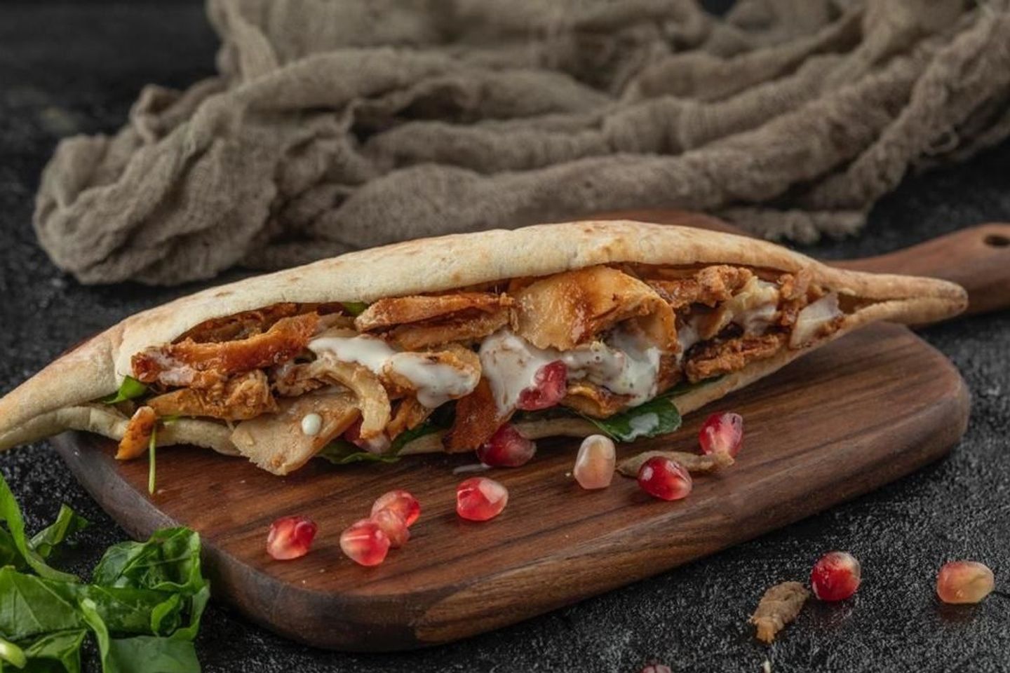 Chicken With Pomegranate, Arugula And Tahini