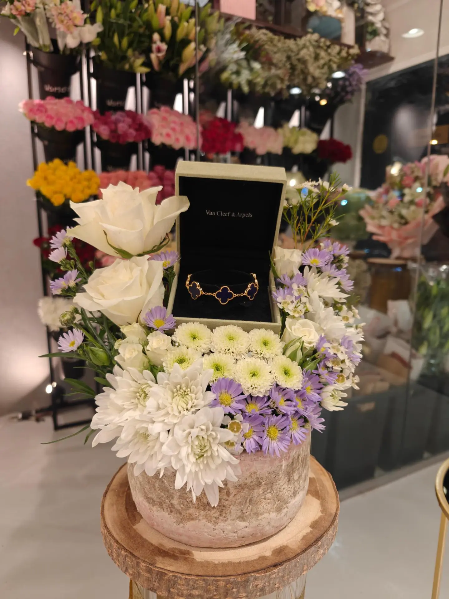 Marble Vase With Van Cleef & Arpels Natural Rose Bracelet