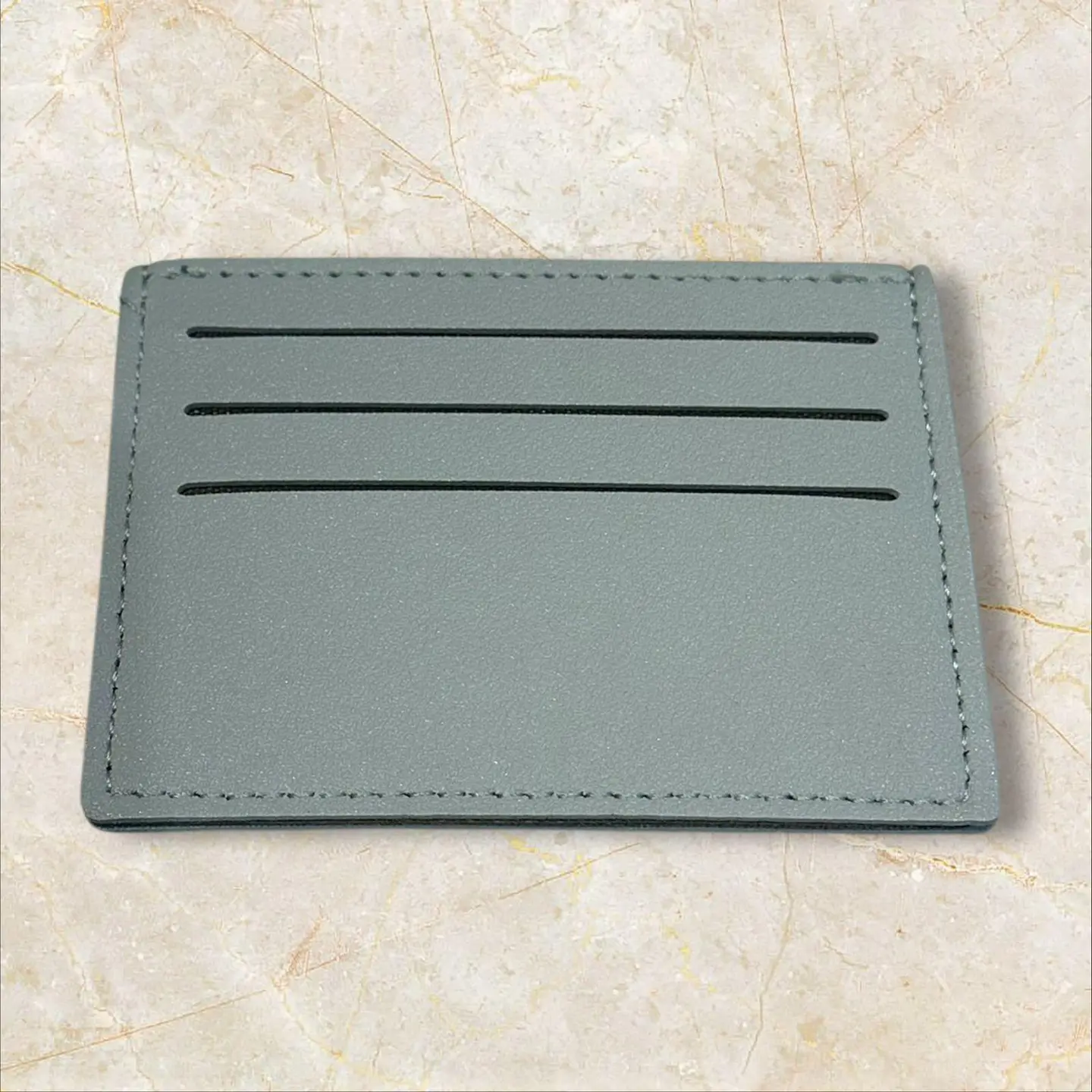 محفظه رصاصي جلد مع نحت الاسم 2