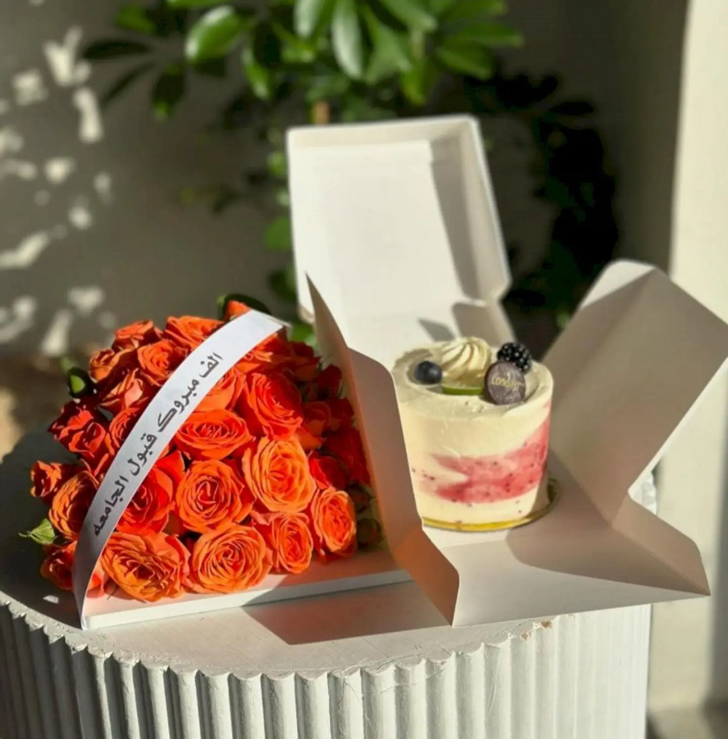 Kundera Cake With Orange Roses