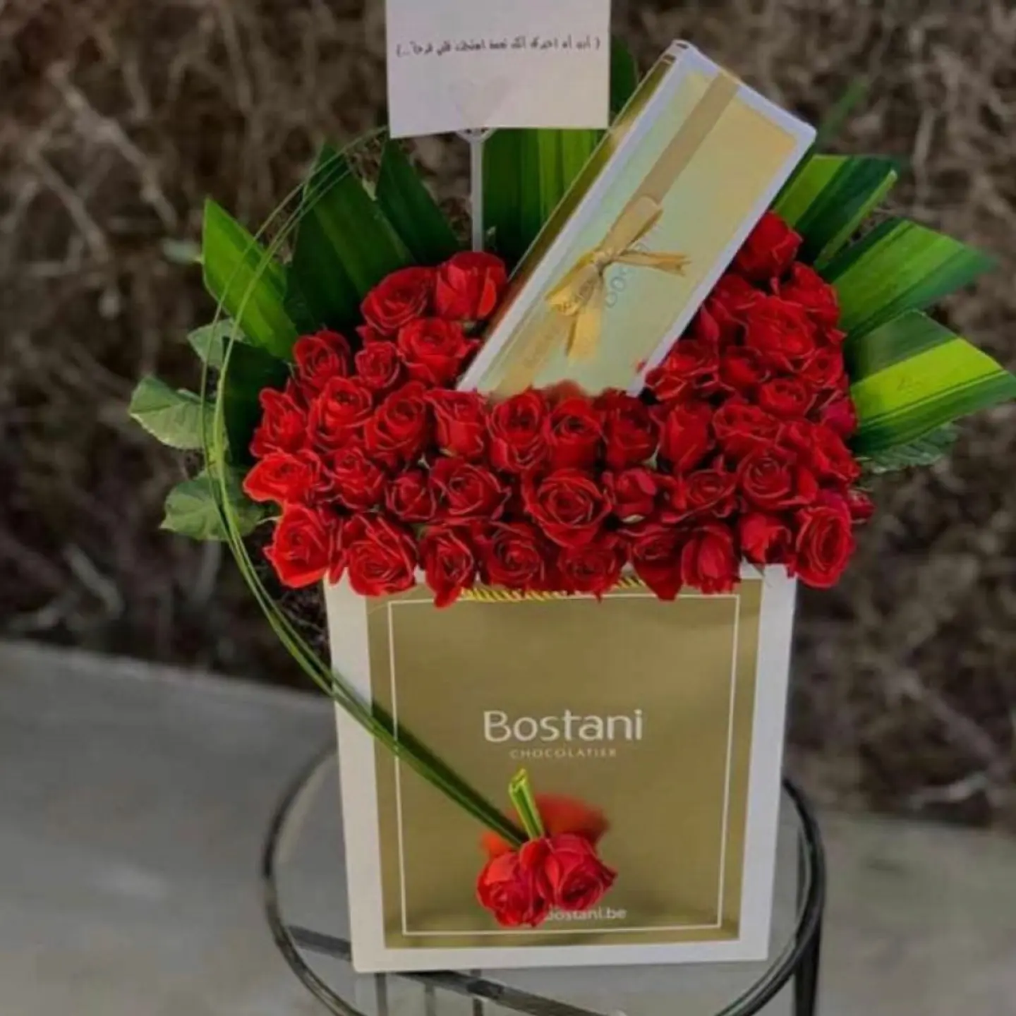 The Beauty Of Red Roses Blended With The Beauty Of Bostani Sweets