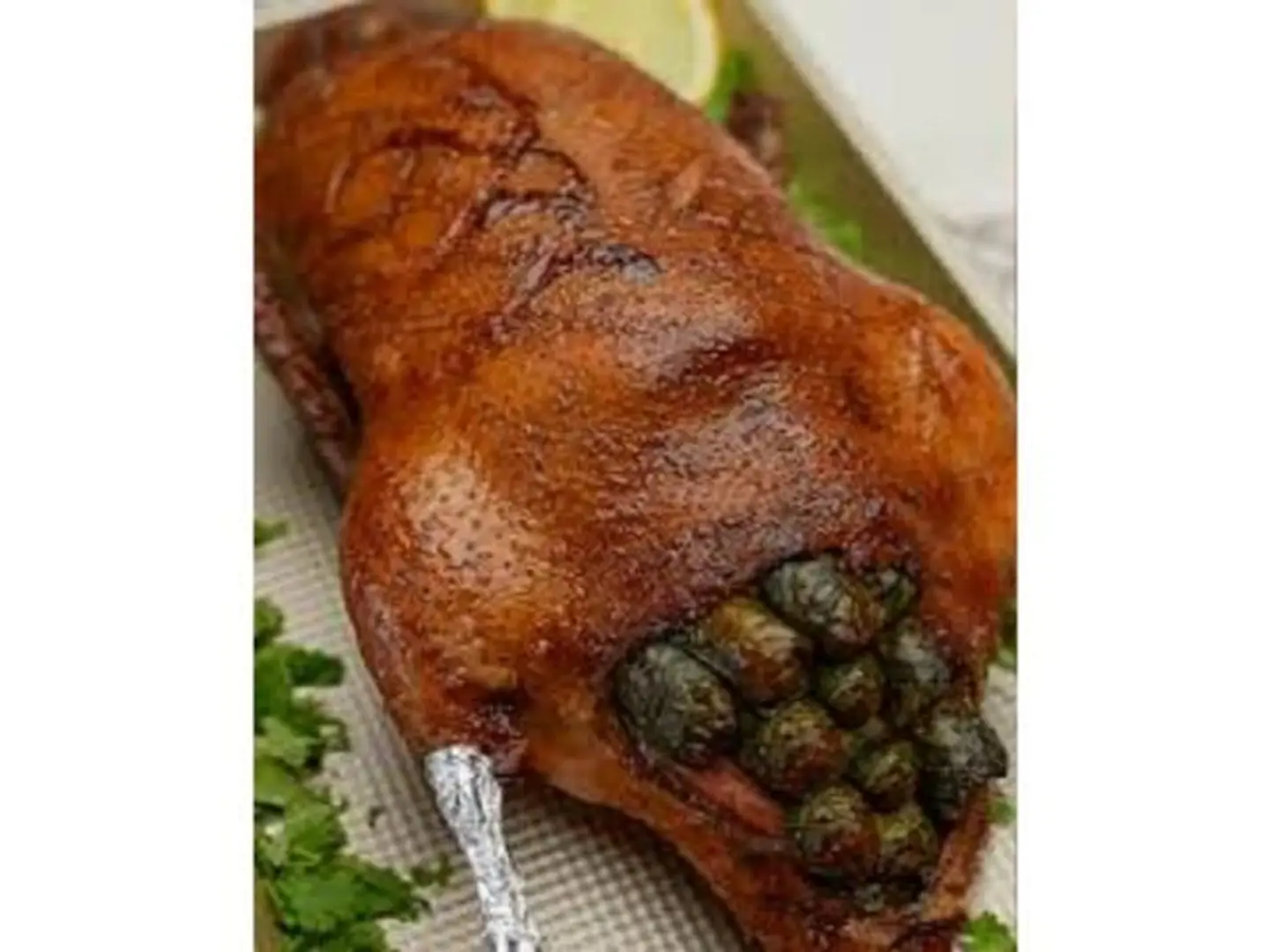 Half Duck With Stuffed Grape Leaves