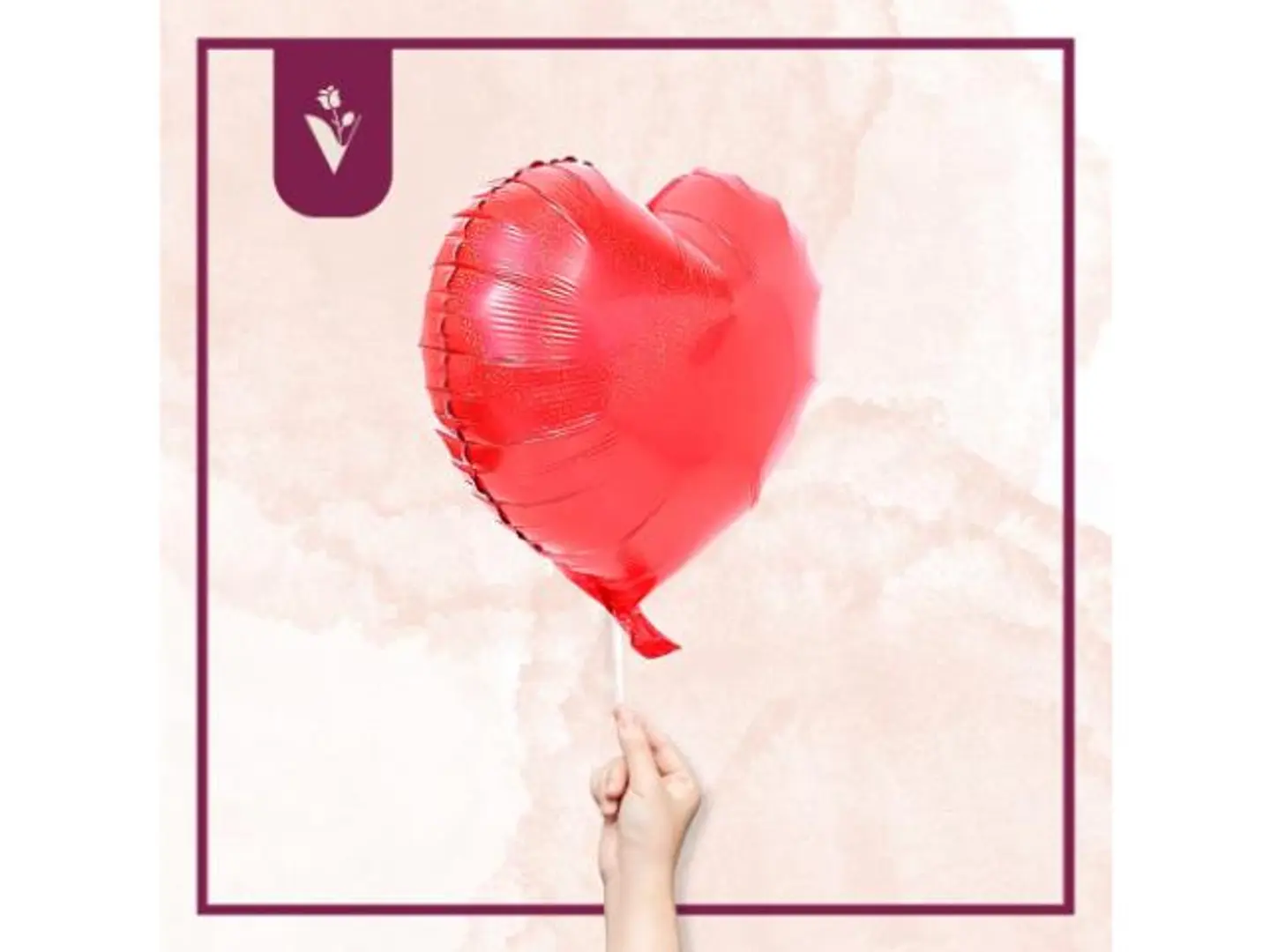 بالون القلب الأحمر