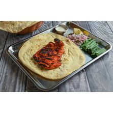 قطعة دجاج تندوري (صلصة حارة، قطعتان من خبز التندوري)