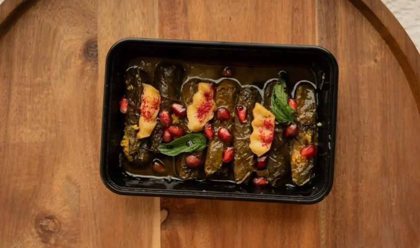 Grape Leaves, Molasses, Pomegranate