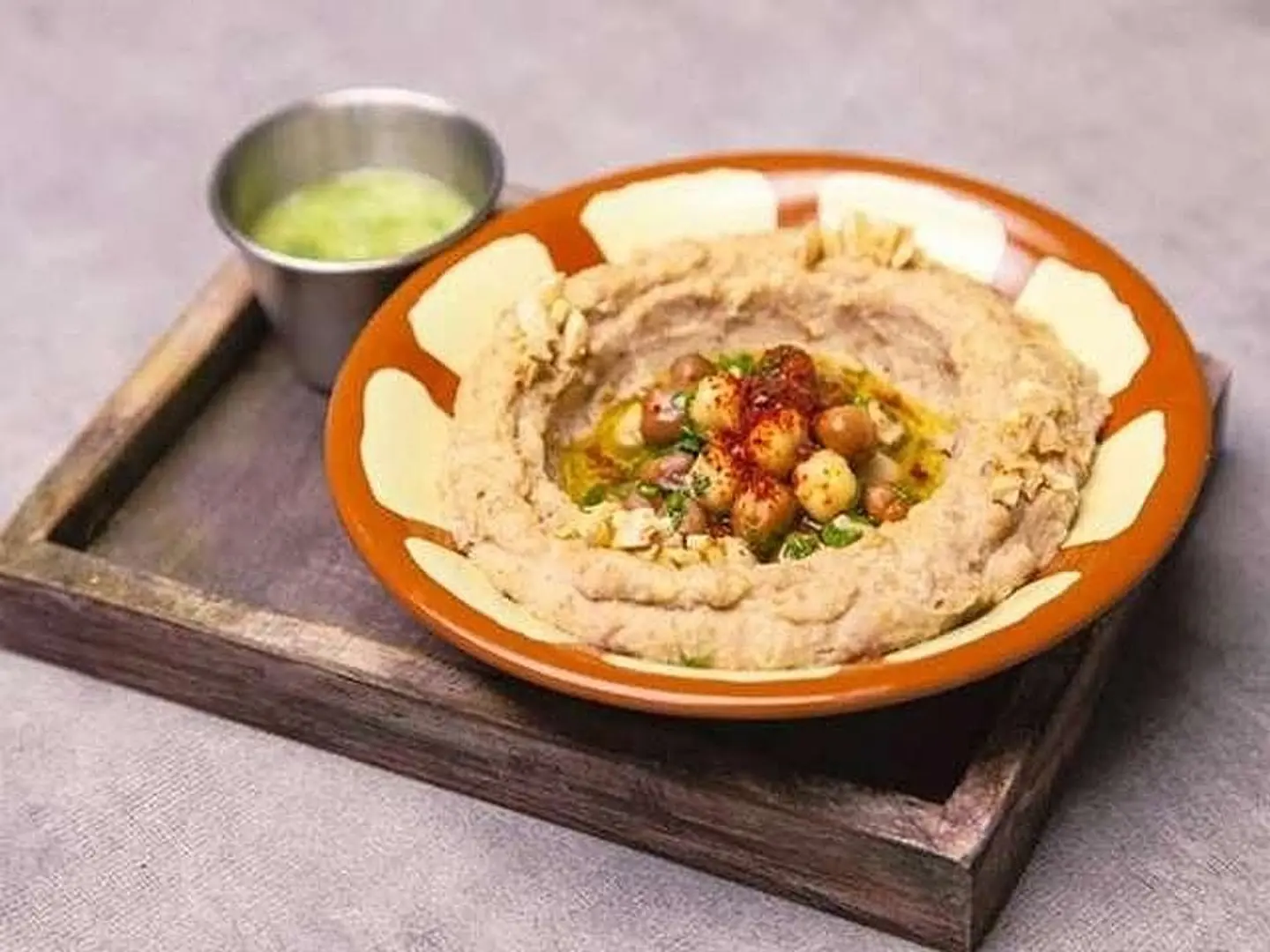 A Mix Of Hummus And Fava Beans With Tahini And Lemon.