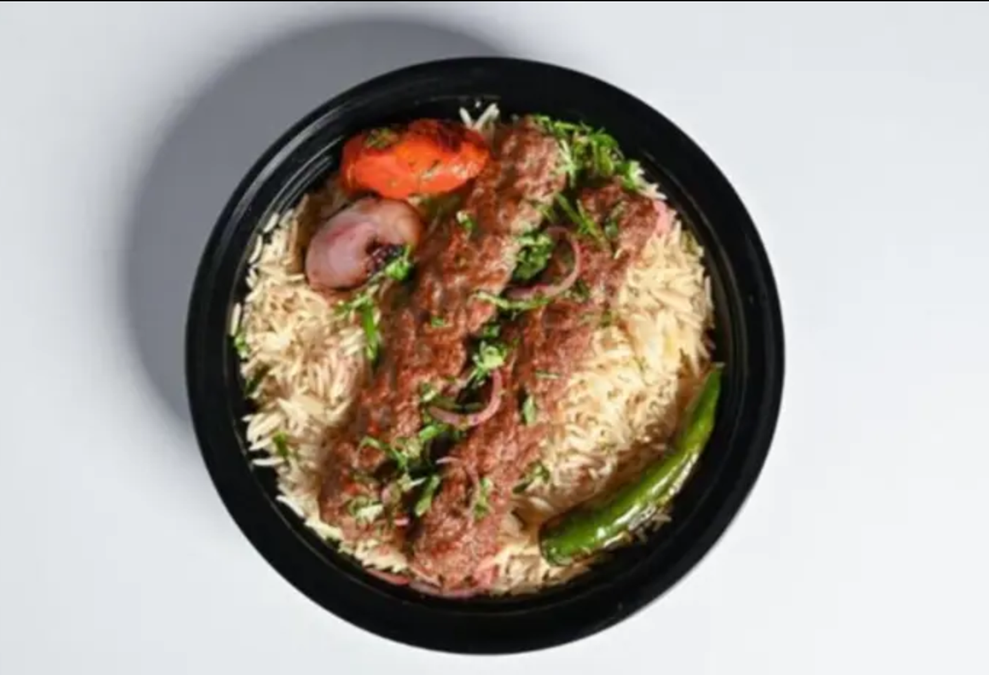 Two Skewers Of Lamb Kebab With Ric Tahini Sauce And Hot Dakou