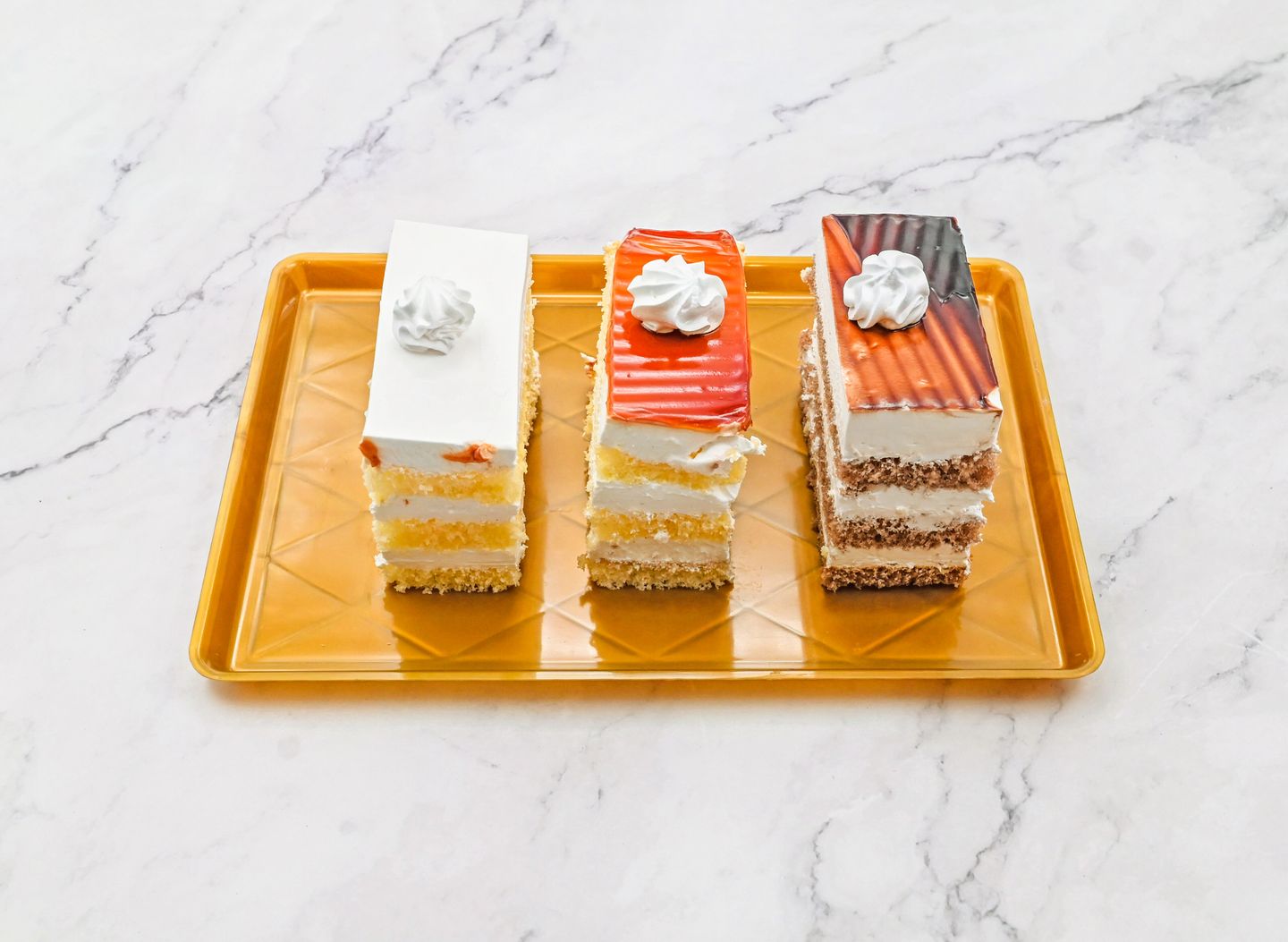 Pieces Of Cake With Different Flavors