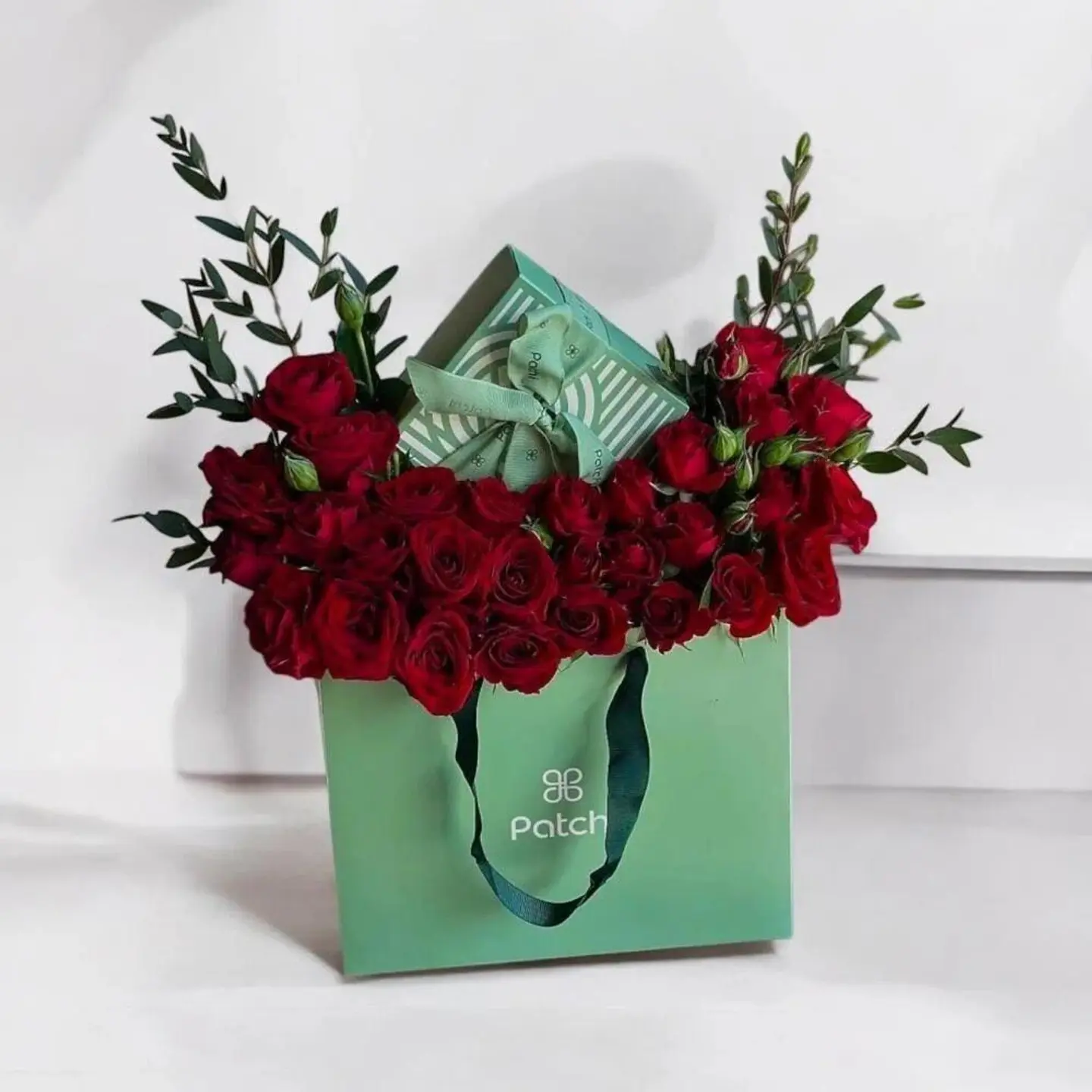 Charming Red Bouquet With Patchi