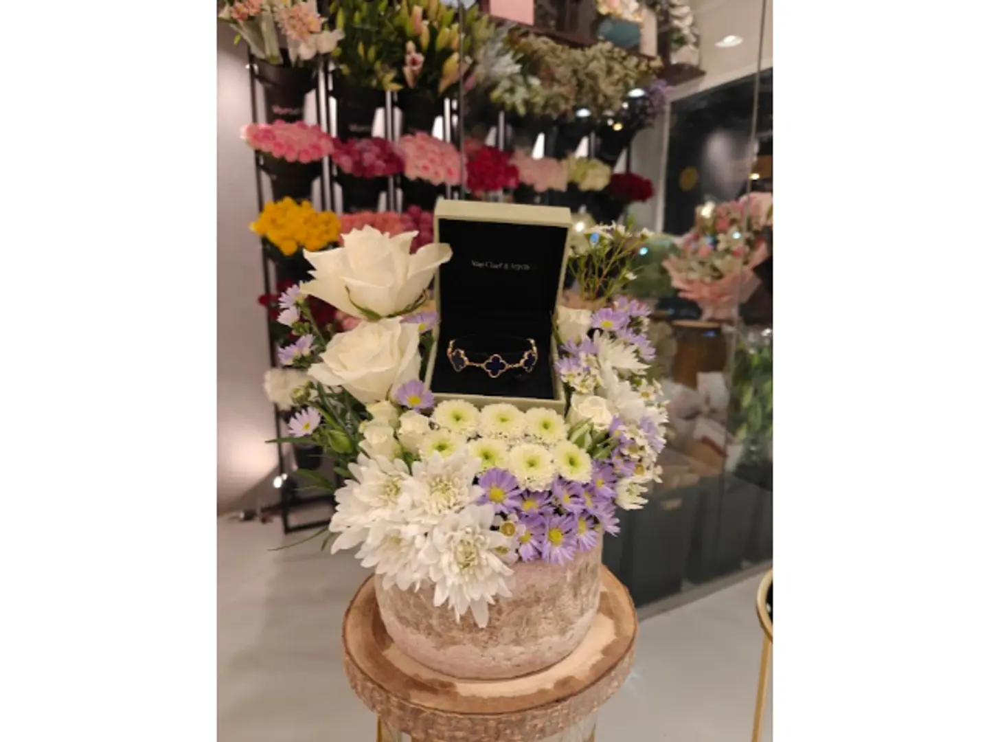 Marble Vase With Van Cleef & Arpels Natural Rose Bracelet