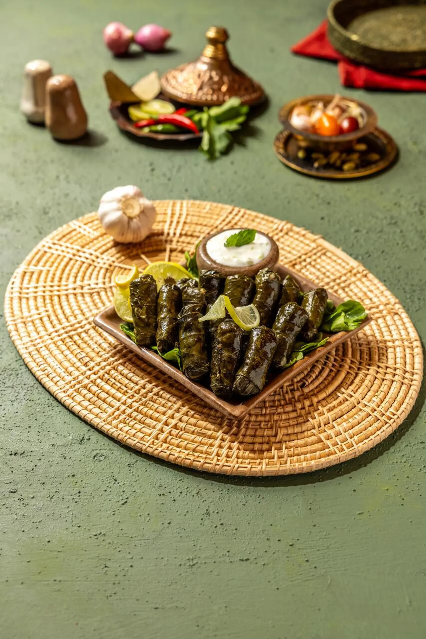 Stuffed Vine Leaves Served With Mint Yogurt Sauce