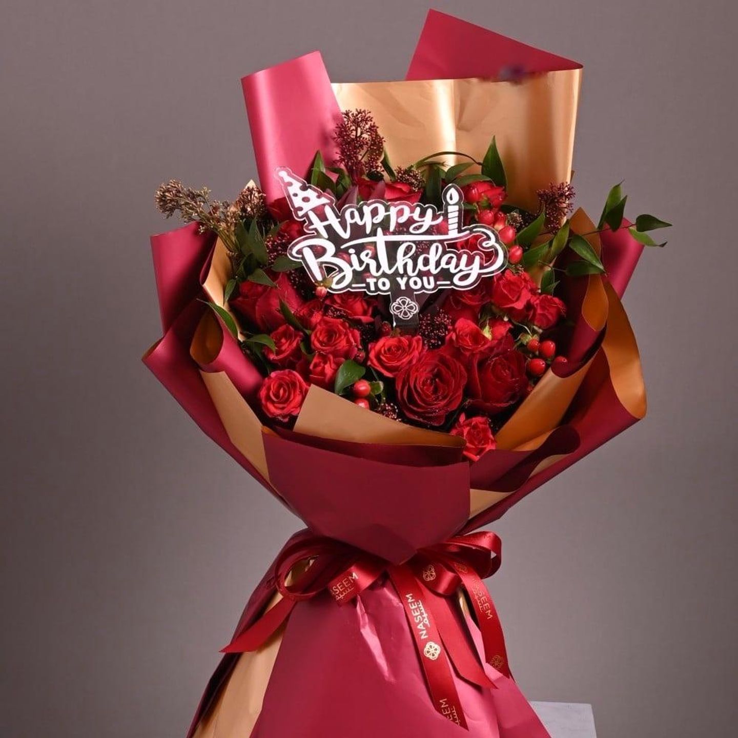 A Bouquet Of Warm Roses With A Birthday Greeting