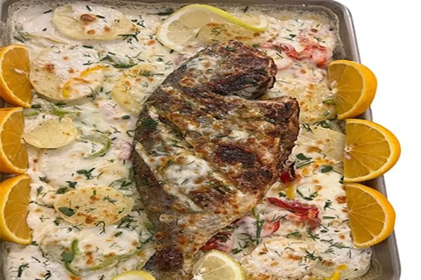 صينية سمك شرقي بالبطاطس